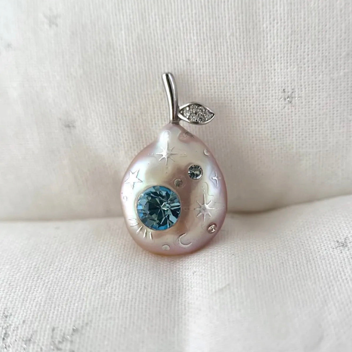 Pear-shaped Emerald Cubic Zirconia Accents